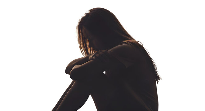 Silhouette of sad woman sitting alone, conceptualizing depression, loneliness, stress, and mental health issues isolated PNG with Transparent Background