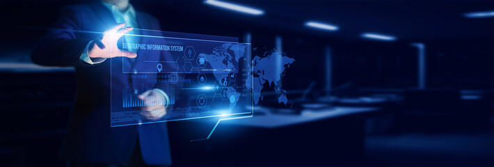 Analyst pointing to a geographic information system map with analyzing spatial data, geolocation accuracy, terrain mapping, and urban planning insights.