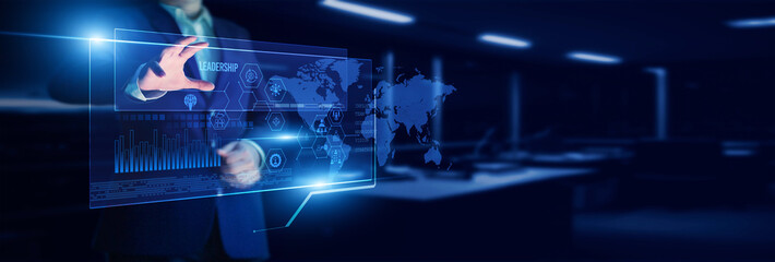 Executive pointing leadership strategy plan with analyzing team development, vision building, motivational performance, goal achievement, and organizational success.