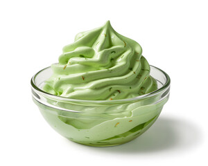 Indulge in refreshing mint green soft serve ice cream swirled perfectly in a clear glass bowl, a delightful summer treat.