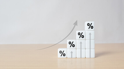 Interest rate financial and mortgage rates concept. White dice with Icon percentage symbol and...
