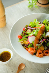 A Colorful and Delicious Salad in a Bowl with Dressing