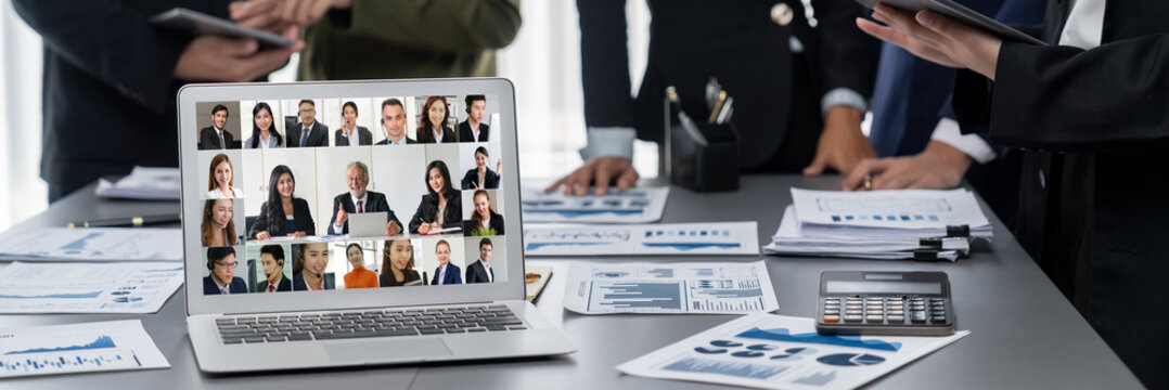 Business people on video conference for brisk virtual group meeting of corprate business office workers