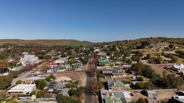 Burra, South Australia &ndash; 4K Aerial Drone Footage of Historic Pastoral Town, Country Houses, Estates, Streets, Canola Fields, and Wind Turbines in the Mid-North Agricultural Region