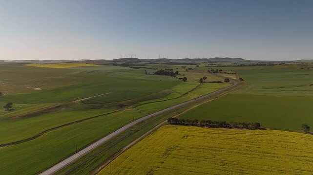 Midnight Oil House, Burra, South Australia &ndash; 4K Drone Footage Featuring Iconic Heritage Cottage in Yellow Canola Fields and Rolling Farmland near Barrier Highway