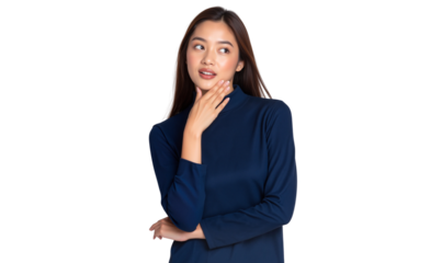 Thoughtful young Asian woman looking sideways, contemplating a decision, isolated on transparent background