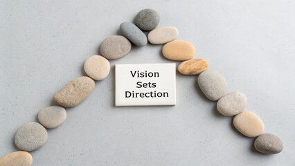 Vision Sets Direction Concept with Smooth Stones Arrangement