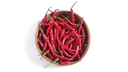 Top view of Red chili peppers or Cabai Merah Keriting on bamboo bowl. Isolated on white background with copy space. Perfect for design element, spicy food concept or any commercial usage.