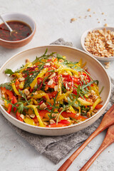 Thai salad with mango and peanut dressing