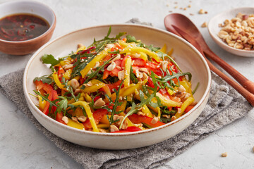 Thai salad with mango and peanut dressing
