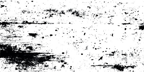 Black patches and rough scratch marks while transitions into lighter scattered textures and streaked diagonal lines.