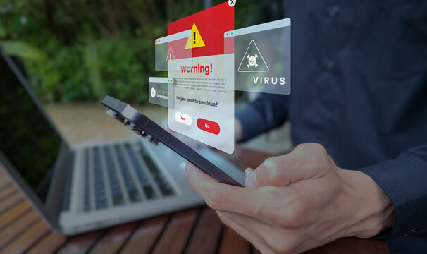 Cybersecurity Risk, Smartphone and Laptop with Virus Alerts and Security Warnings