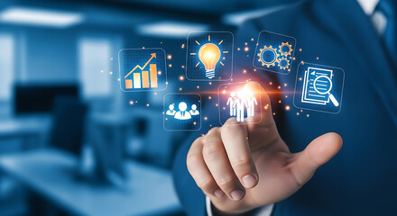 Hand interacting with digital icons representing business concepts on a blue background