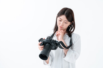 カメラ　悩む女性