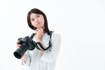 Fotobehang Muziek カメラ　悩む女性  © naka