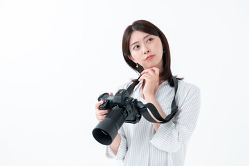 カメラ　悩む女性