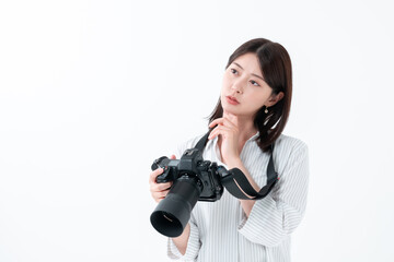 カメラ　悩む女性