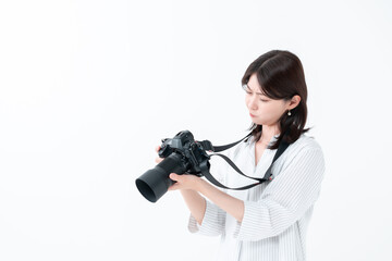 カメラ　悩む女性