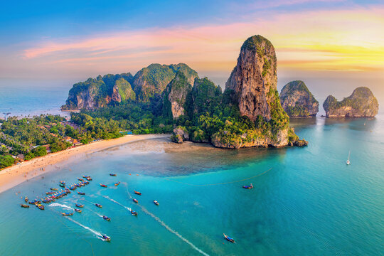 Railay beach with long tail boat in Krabi, Thailand.