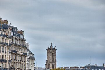 Santiago Tower in Paris with 16th-century flamboyant Gothic architecture and gray sky in an urban and heritage setting