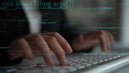 Hands engaged in typing on a keyboard with floating code in the background, symbolizing the dynamic world of programming and software development in modern technology. Xenic