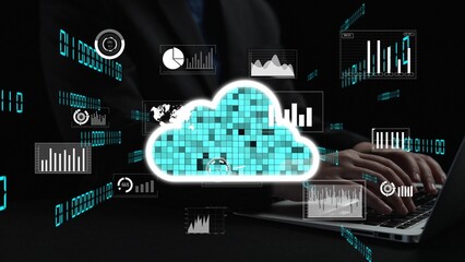 A professional engages with cloud technology on a laptop, surrounded by dynamic data visuals showcasing analytics and business insights in a modern workspace. Xenic