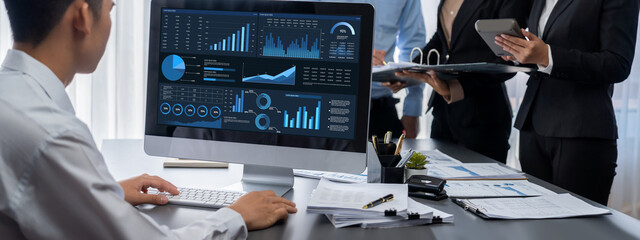 Business intelligence and data analysis concept. Analyst team working on financial data analysis...