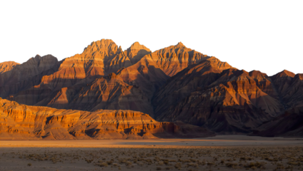 Transparent Png of a Majestic Desert Mountain Range, Rugged Peaks Bathed in Golden Sunrise Light, Casting Long Shadows over a Vast Arid Landscape