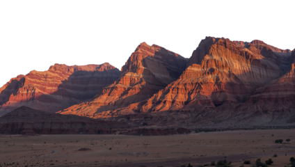 Transparent Png of a Majestic Panoramic Wide angle Landscape of Dramatic Red Rock Mountains Glowing in Golden Sunset Light, with a Vast Desert Floor