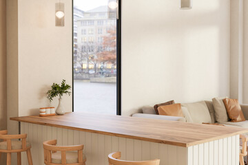 Vase and jar on wooden counter table with chairs aside glass door and sofa in a living room or cafe.