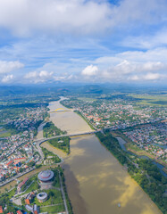 Aerial view of Hue City in Vietnam. Many bridges and Imperial Royal Palace of Nguyen dynasty nearby. Travel and landscape concept