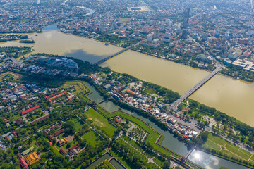 Aerial view of Hue City in Vietnam. Many bridges and Imperial Royal Palace of Nguyen dynasty nearby. Travel and landscape concept