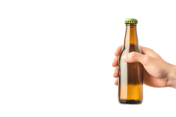 A hand holding a glass bottle filled with amber beverage on a white background.
