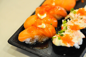 salmon sushi ,sushi or rice topped with salmon or salmon roll and shrimp egg