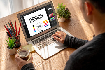 Graphic designer software for modern design of web page and commercial ads showing on the computer...