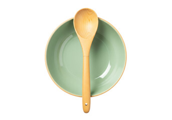 Wooden spoon and light green bowl isolated on transparent background, kitchen utensil for cooking and serving food
