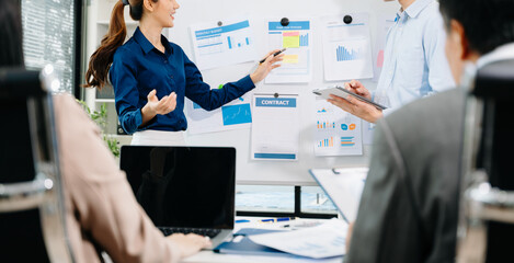 Business team discuss at meeting room. working together with laptop ,tablet and smart phone on desk Financial accountant , planner , meeting , introduction concept. At office