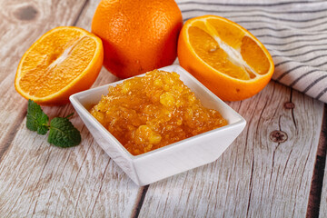 Sweet orange jam in the bowl