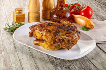 Baked in oven whole chicken with spices
