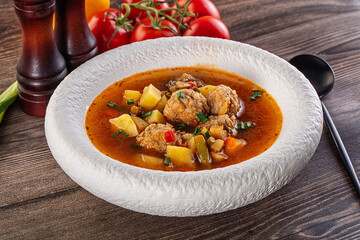 Tomato Soup with meatballs and vegetables