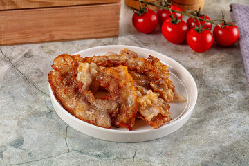Fried crispy pork bacon snack