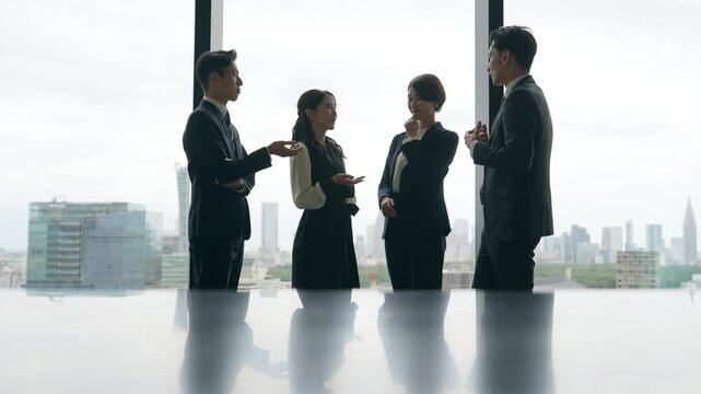 Group of business people having a conversation in the office