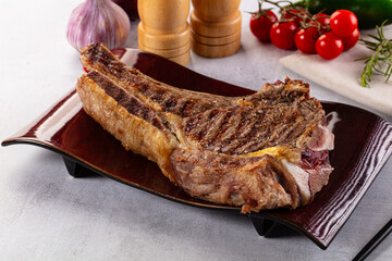 Grilled ribeye beef steak with bone