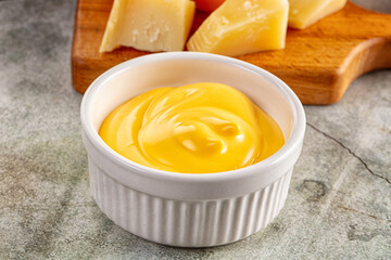 Yellow cheddar cheese creamy sauce