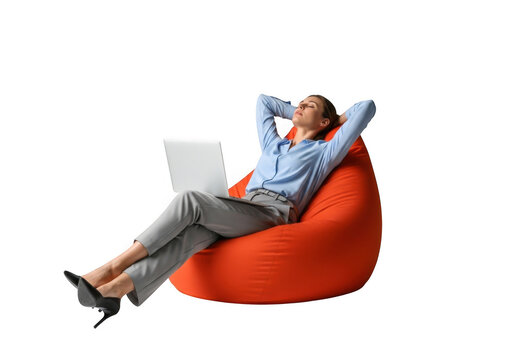 Relaxed woman in business attire using laptop while reclining on orange bean bag isolated on transparent background - Powered by Adobe