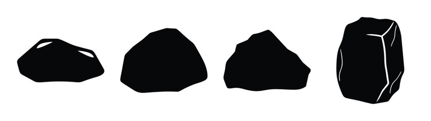 Collection of four diverse black rocks showing varied textures and shapes isolated on white