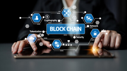 A business professional engages with a digital blockchain interface on a tablet, highlighting security and innovation aspects crucial for modern finance and technology. Tessel