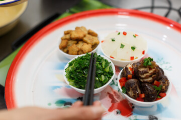 A variety of delicious vegetable foods, symmetrical in Chinese style, for offering to Buddha
