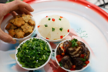 A variety of delicious vegetable foods, symmetrical in Chinese style, for offering to Buddha