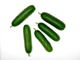 Group of mini Cucumbers isolated on a white background